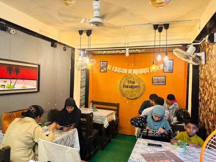 Families dining together during a birthday celebration